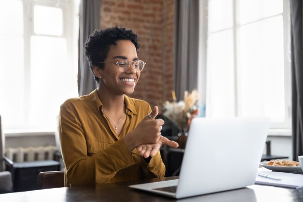 Women on a laptop using sign language on a video call